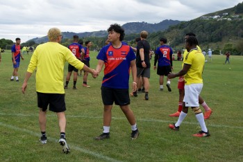 Multicultural Football Tournament 2022, Bhutan-latin-bros-handshake.jpeg